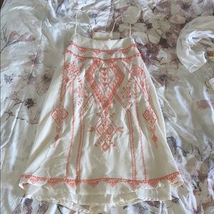 cream tank with designs